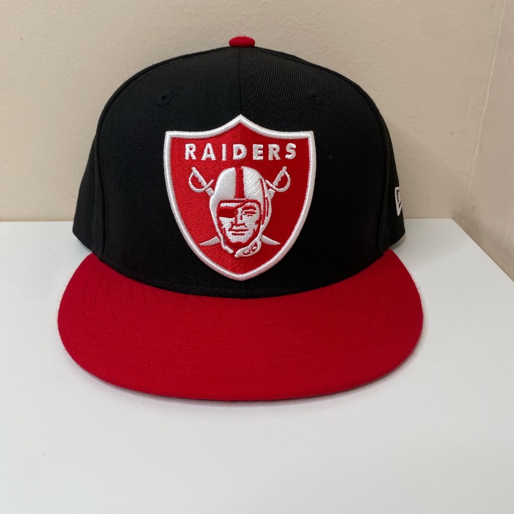 Black and red Raiders snap back hat